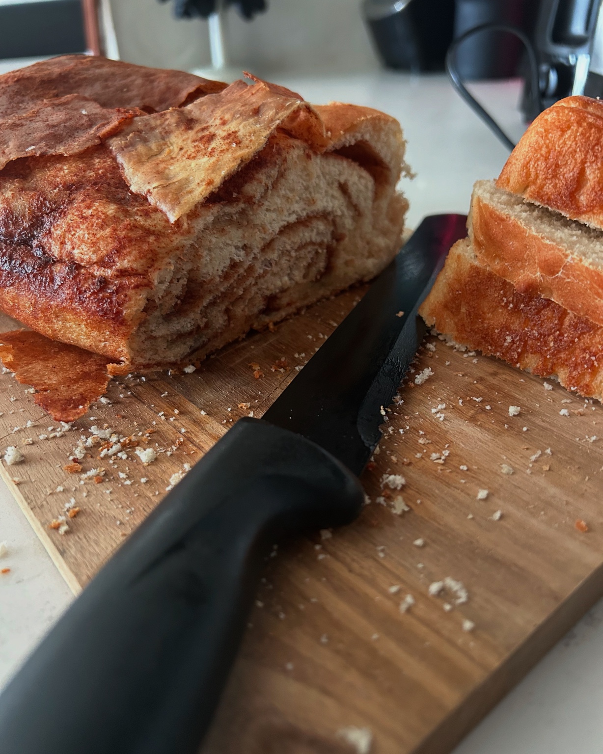 Cinnamon loaf with a golden crust and sliced cinnamon interior